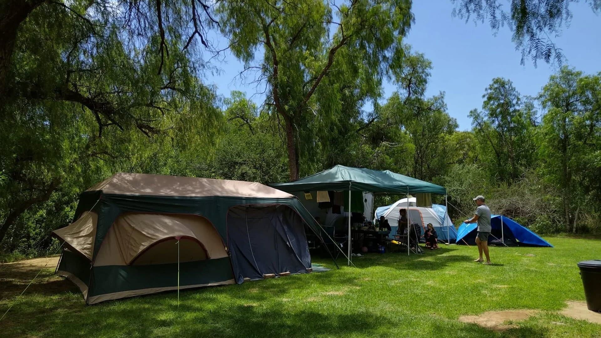Camping under the trees at Red Dune Camp